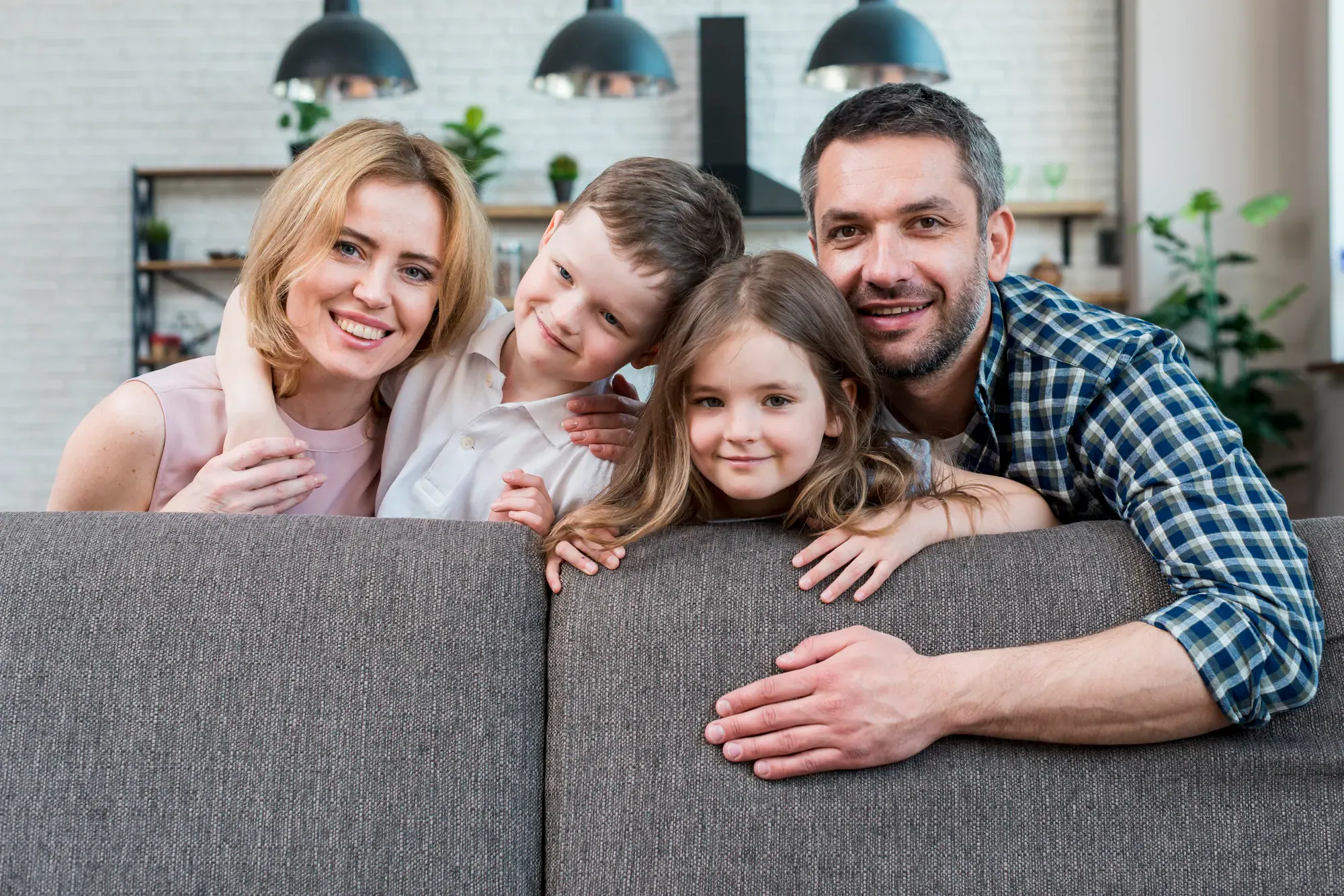 Happy family in their home