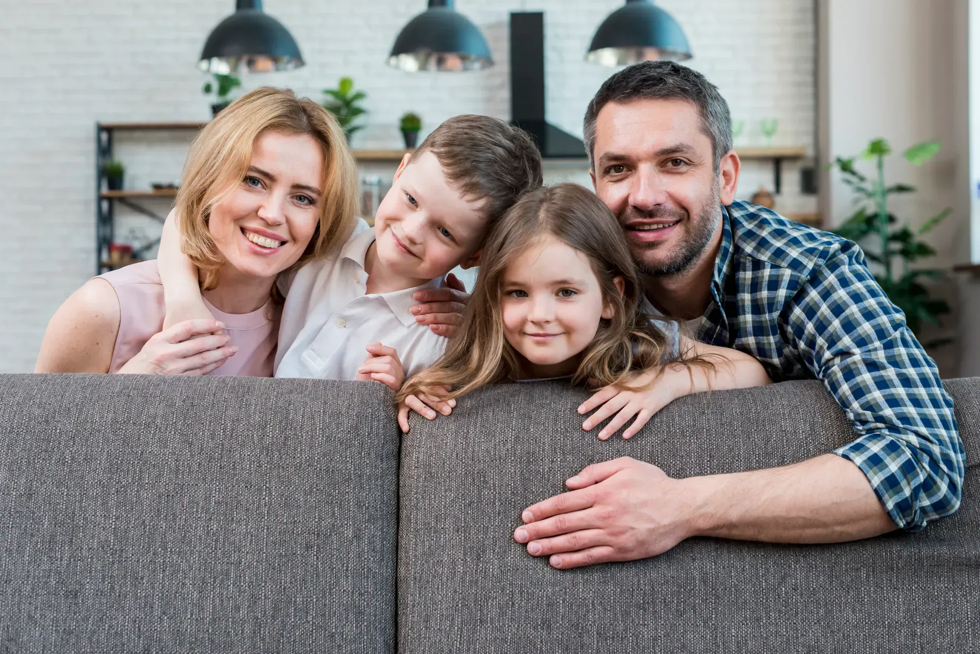 Happy family in their home